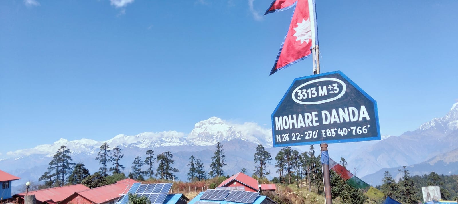 Community lodges with solar panels at Mohare Danda peak